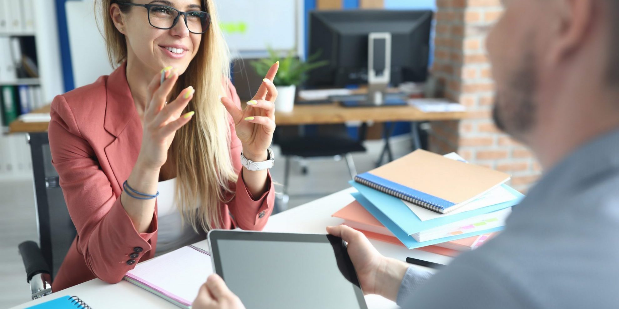 Image of smiling confident woman illustrates blog: "Employee Retention: Here’s How Background Screening Can Help"