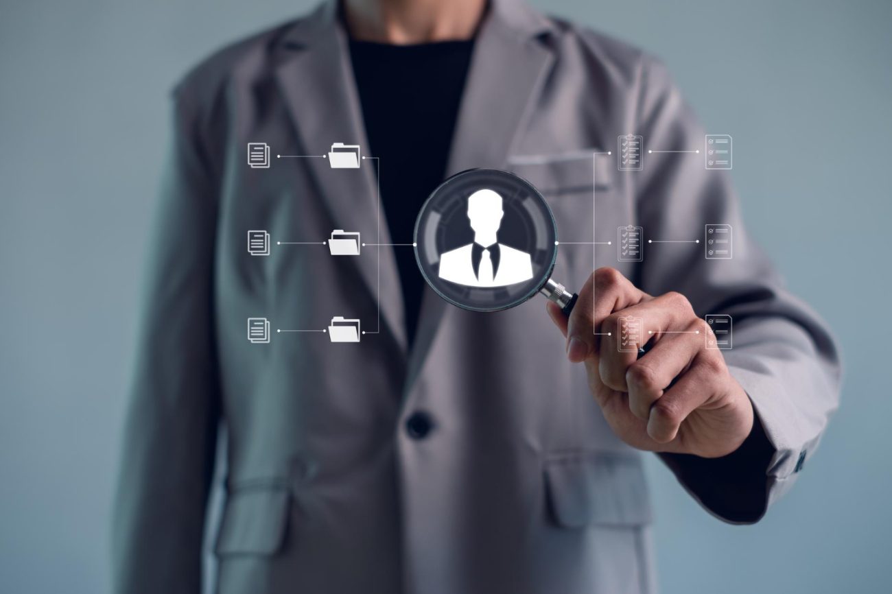 online-documentation-database-process-automation-efficiently-manage-filescorporate-business-technologydocument-management-system HR professional explaining transparent background screening to job candidate